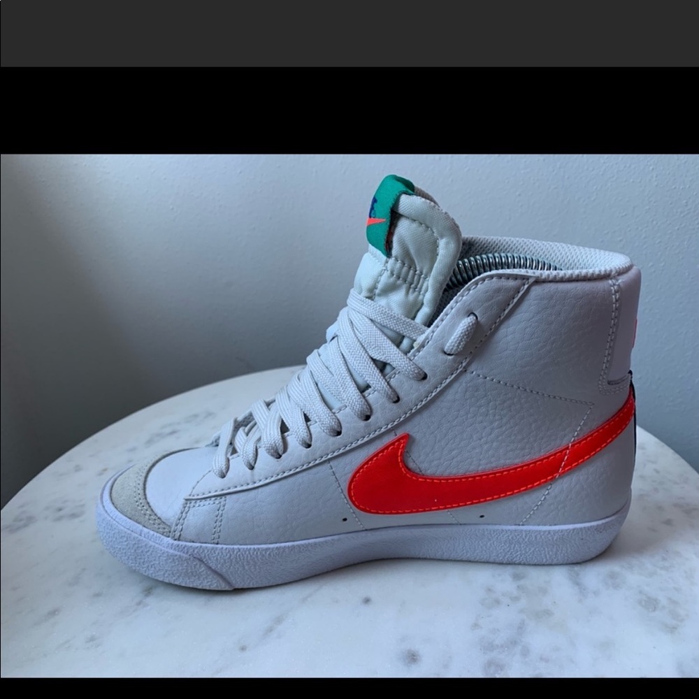Nike mid Blazer 77 white with orange and green detail. Boys size 5.5